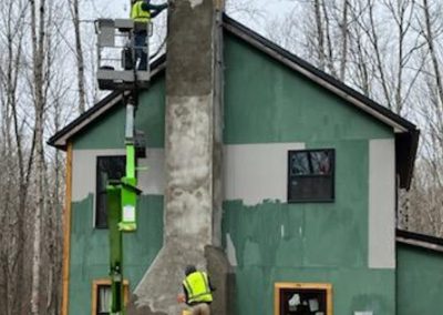 Plastering a chimney in Lyles, TN.